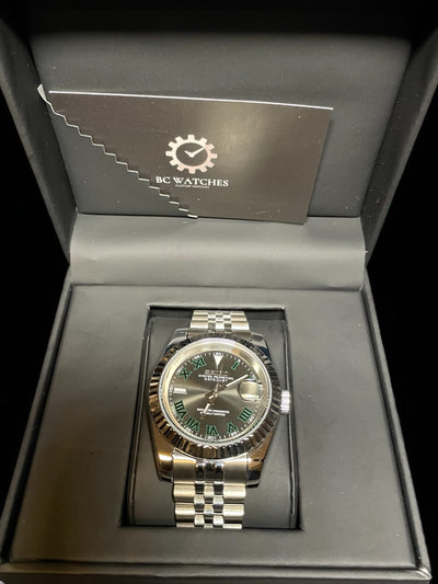 Silver watch in a black box with BC Watches logo